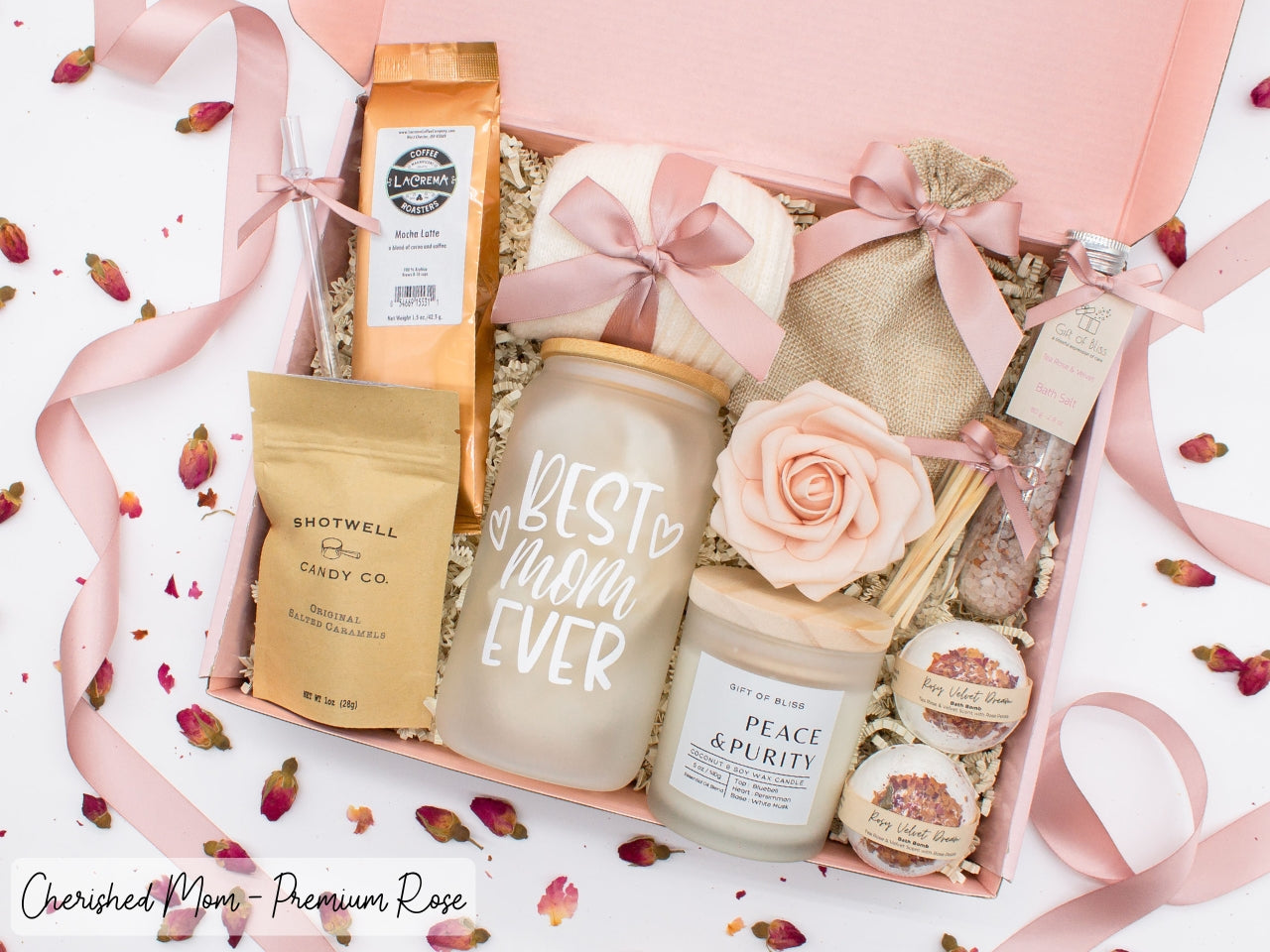 Mom gift box with fragrant bath treats, mom designed glass cup, mocha latte coffe, soft caramels, relaxing candle, cozy socks, and a beautifull rose. Pick from one of the three scents: Rose, Lavender, or Jasmine. Perfect to pamper and honor moms.
