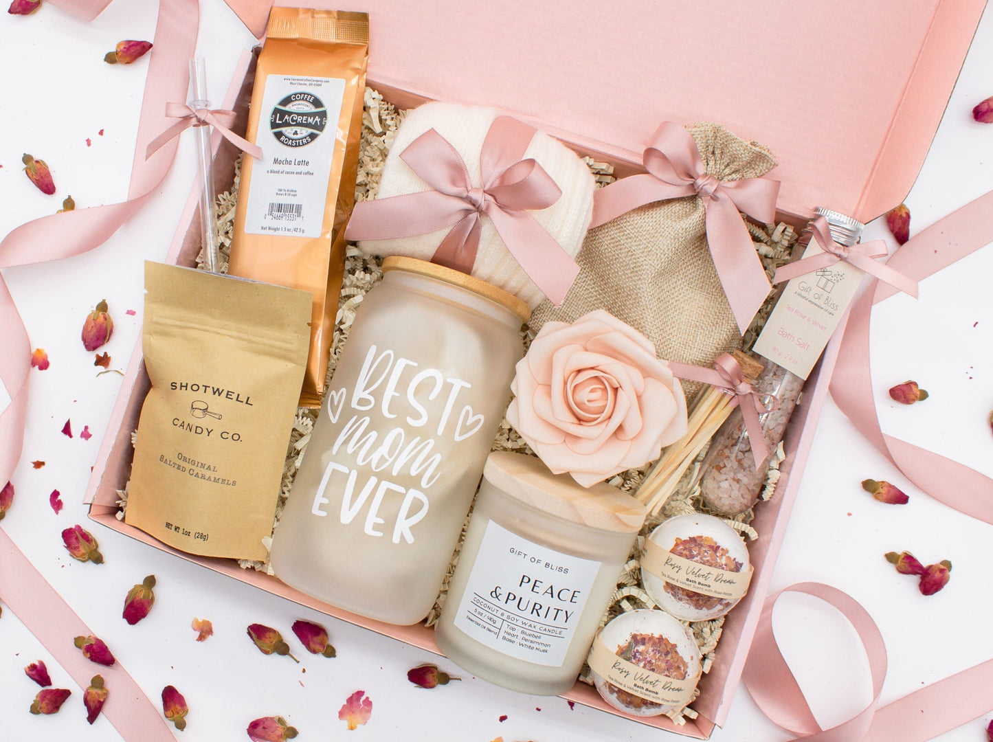Mom gift box with fragrant bath treats, Best Mom Ever glass cup, mocha latte coffe, soft caramels, relaxing candle, cozy socks, and a beautifull rose. Pick from one of the three scents: Rose, Lavender, or Jasmine. Perfect to pamper and honor moms.
