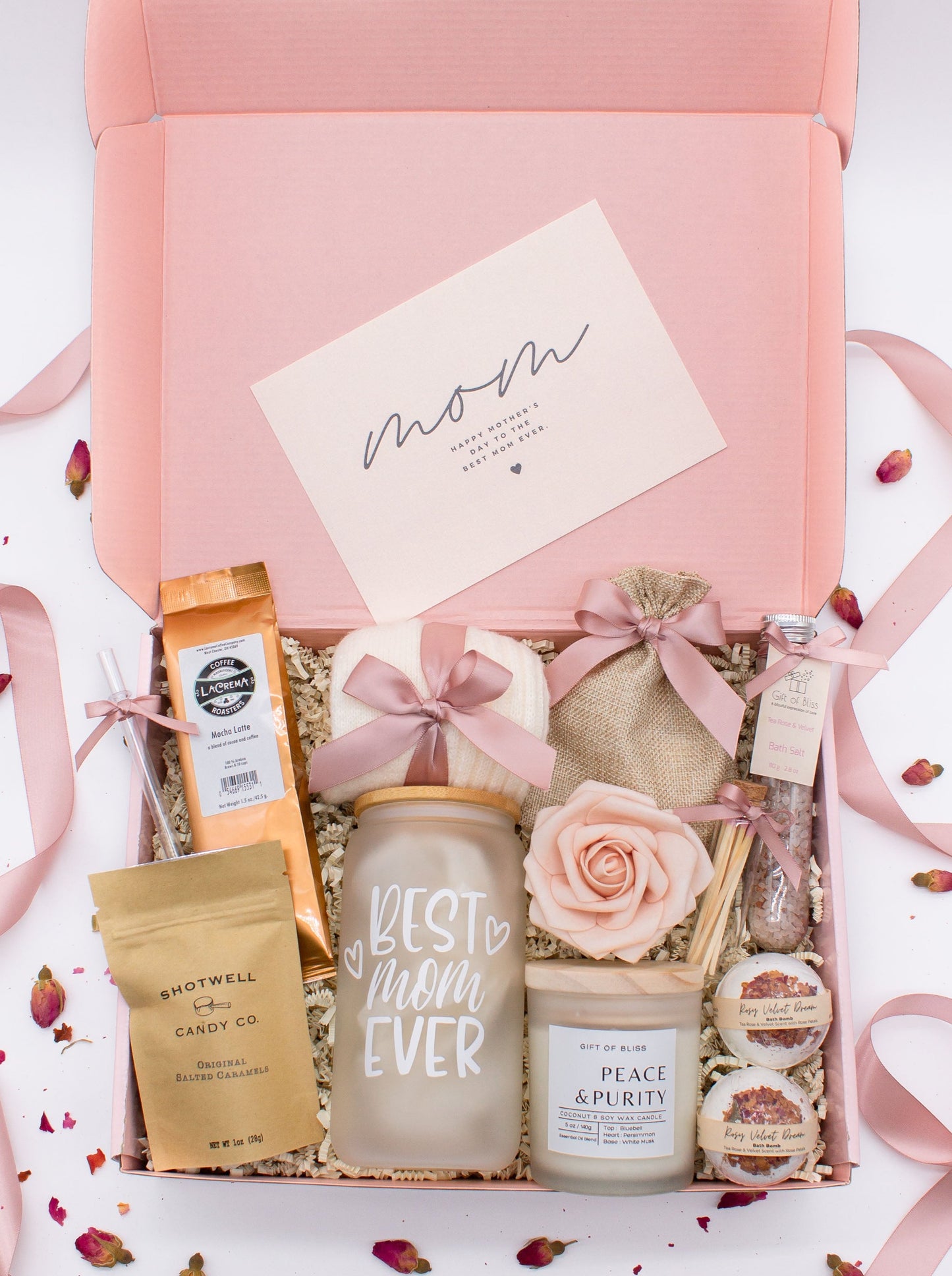 Mom gift box with fragrant bath treats, Best Mom Ever glass cup, mocha latte coffe, soft caramels, relaxing candle, cozy socks, and a beautifull rose. Pick from one of the three scents: Rose, Lavender, or Jasmine. Perfect to pamper and honor moms.