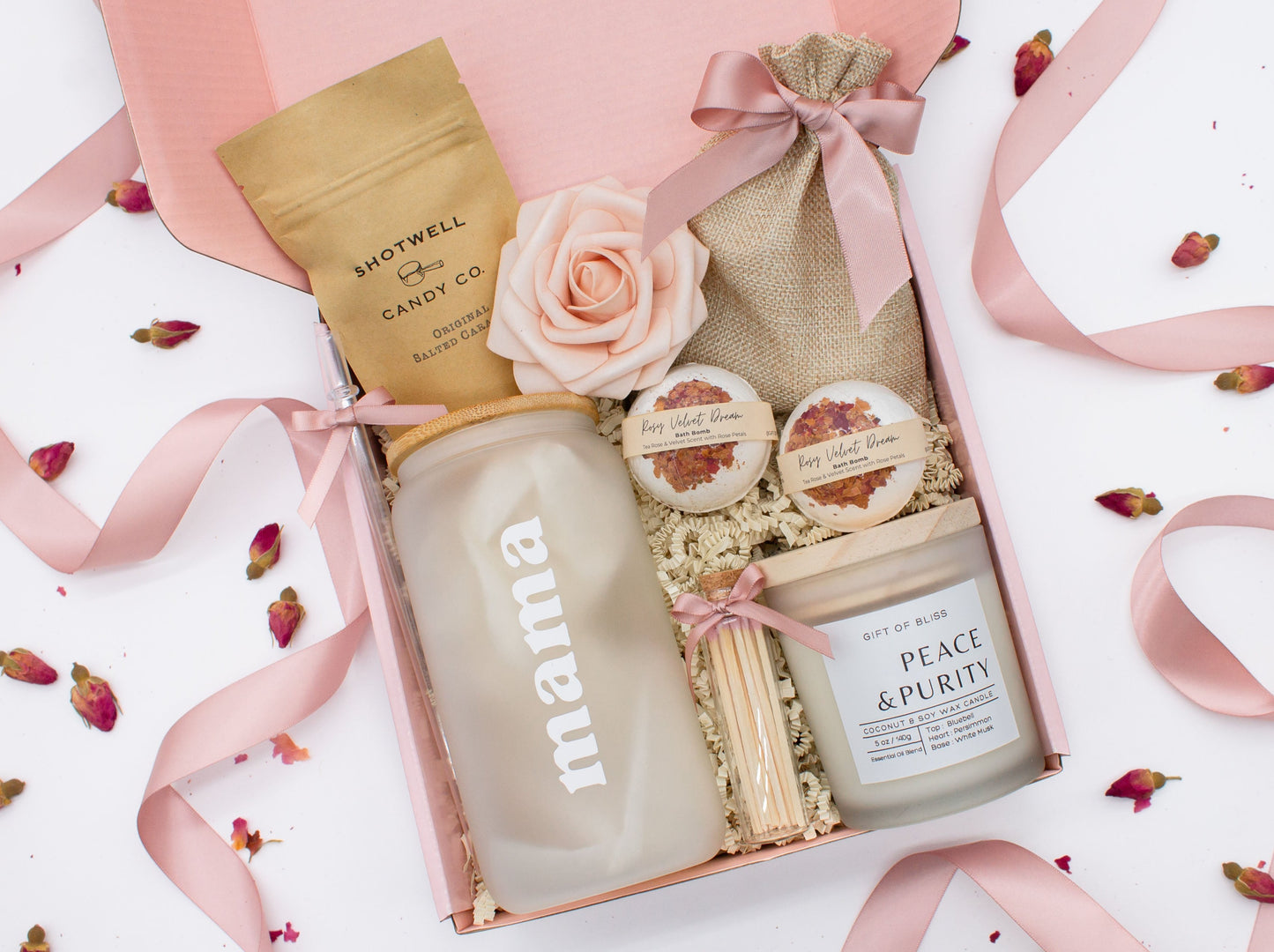 Cherished Mom gift box with fragrant bath treats, a Mama glass cup, soft caramels, a relaxing candle, and a beautifull rose. Pick from one of these three scents: Rose, Lavender, or Jasmine. Perfect to pamper and honor moms.