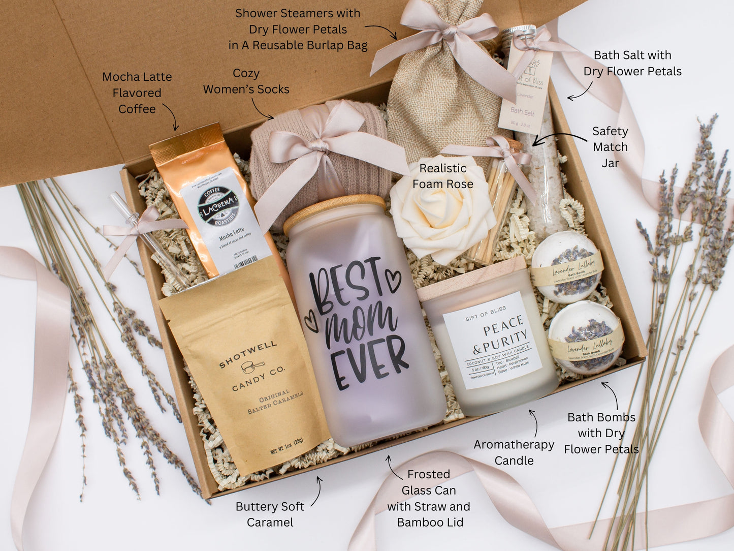 Mom gift box with fragrant bath treats, Best Mom Ever glass cup, mocha latte coffe, soft caramels, relaxing candle, cozy socks, and a beautifull rose. Pick from one of the three scents: Rose, Lavender, or Jasmine. Perfect to pamper and honor moms.