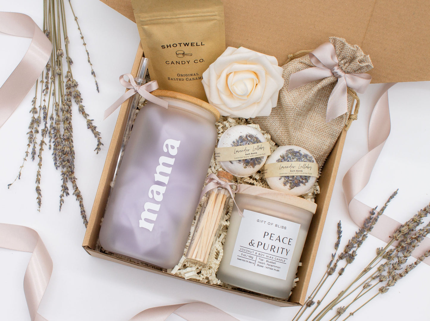 Cherished Mom gift box with fragrant bath treats, a Mama glass cup, soft caramels, a relaxing candle, and a beautifull rose. Pick from one of these three scents: Rose, Lavender, or Jasmine. Perfect to pamper and honor moms.