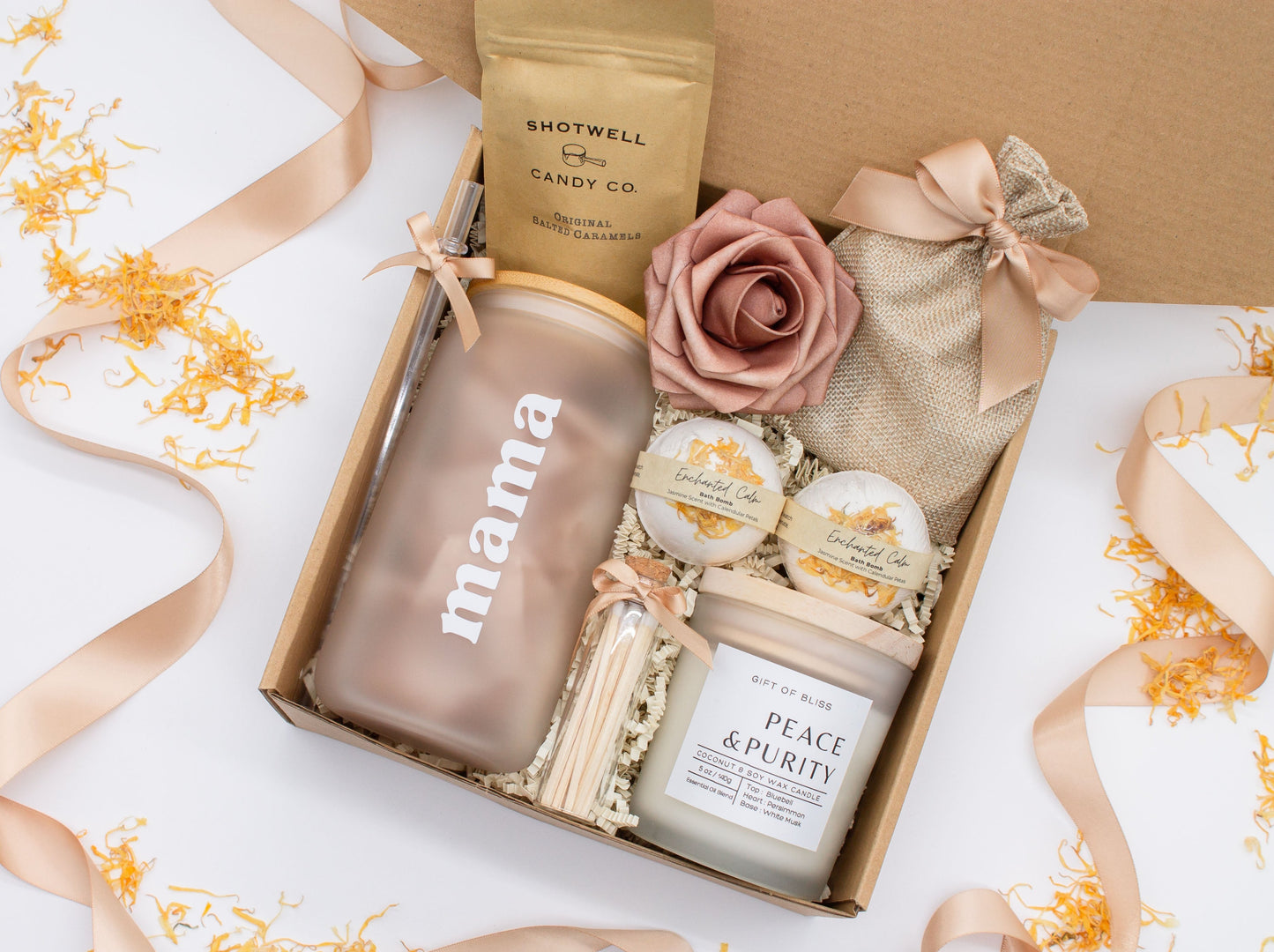 Cherished Mom gift box with fragrant bath treats, a Mama glass cup, soft caramels, a relaxing candle, and a beautifull rose. Pick from one of these three scents: Rose, Lavender, or Jasmine. Perfect to pamper and honor moms.