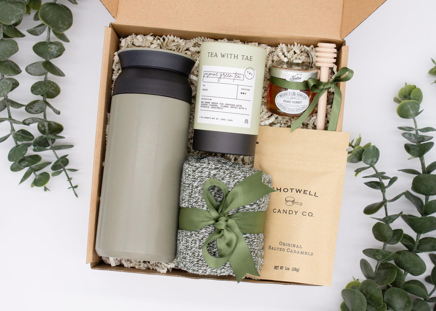 Specially crafted gift box for men, ideal for anyone. Includes a stainless steel tumbler, tea, honey, sweet treats, and cozy socks. Perfect for relaxation & appreciation, complete with a personalized greeting card.