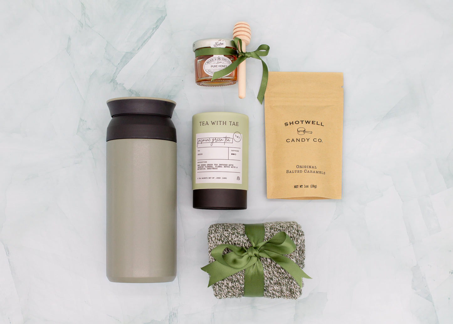 Specially crafted gift box for men, ideal for anyone. Includes a stainless steel tumbler, tea, honey, sweet treats, and cozy socks. Perfect for relaxation & appreciation, complete with a personalized greeting card.