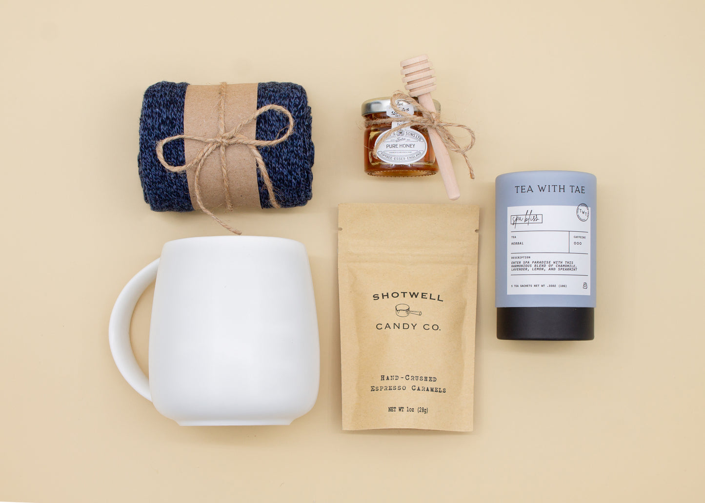 The Dapper Haven Basic (Specially crafted gift box for men. Includes a minimalist ceramic mug, tea, pure honey with wooden dipper, caramel candy, and cozy men's socks. A gift that brings joy and a touch of tranquility to anyone who loves life's finer things.)