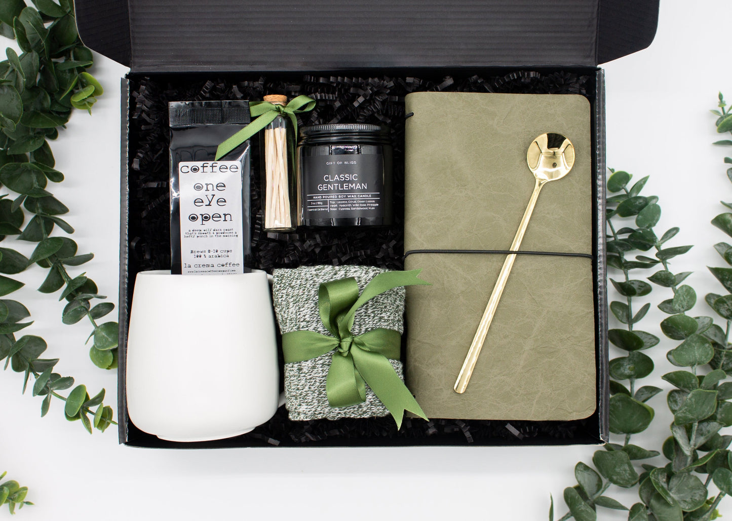 Urban Comfort (Specially crafted gift box, ideal for modern individuals who value style and comfort. Includes 12 oz ceramic mug, long-handled golden spoon, rich coffee, aromatic candles and matches, stylish men's socks, and notebook, all arranged for a memorable experience.)