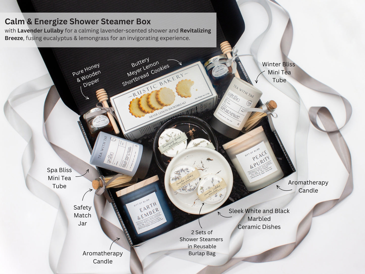 A spa gift box for 2. Features shortbread cookies, 2 soothing tea blends, honey and wooden dipper, 2 aromatic candles, and 2 sets of shower steamers. This elegantly curated box, ideal for couples, enhances shared moments of intimacy and relaxation.