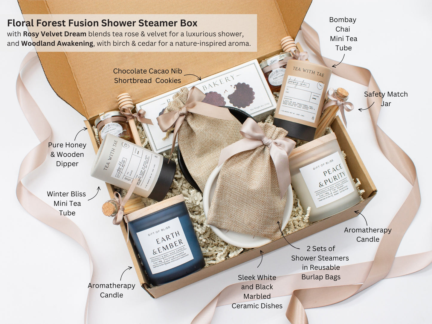 A spa gift box for 2. Features shortbread cookies, 2 soothing tea blends, honey and wooden dipper, 2 aromatic candles, and 2 sets of shower steamers. This elegantly curated box, ideal for couples, enhances shared moments of intimacy and relaxation.