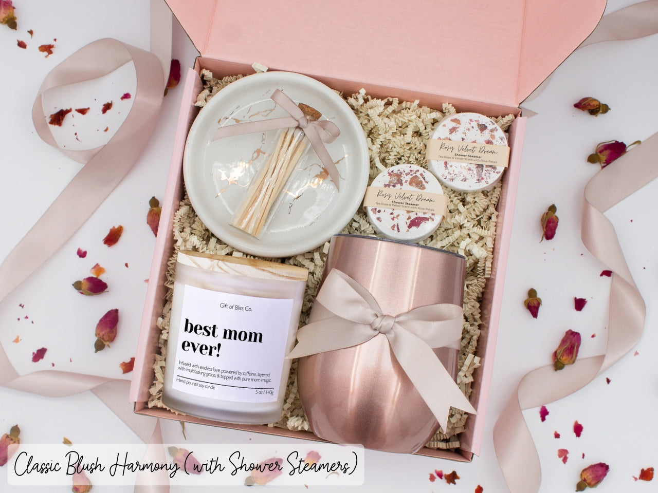 Luxury gift box for her. Featuring a stainless steel tumbler, an aromatherapy candle with mom-themed label and charming match jar, aromatic shower steamers, and a sleek ceramic dish. All items are beautifully arranged for a pampering experience.