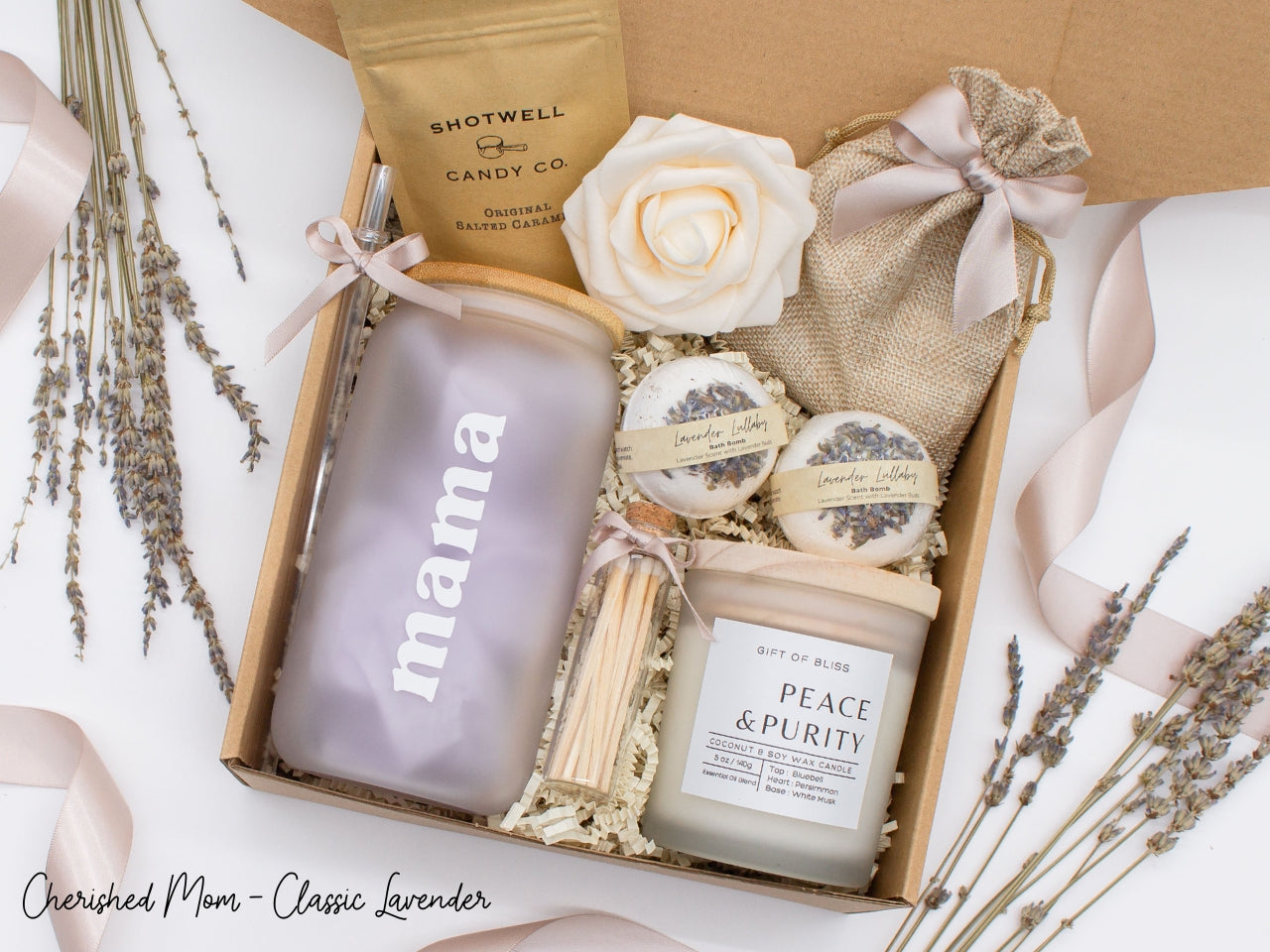 Cherished Mom gift box with fragrant bath treats, mom designed glass cup, soft caramels, a relaxing candle, and a beautifull rose. Pick from one of these three scents: Rose, Lavender, or Jasmine. Perfect to pamper and honor moms.