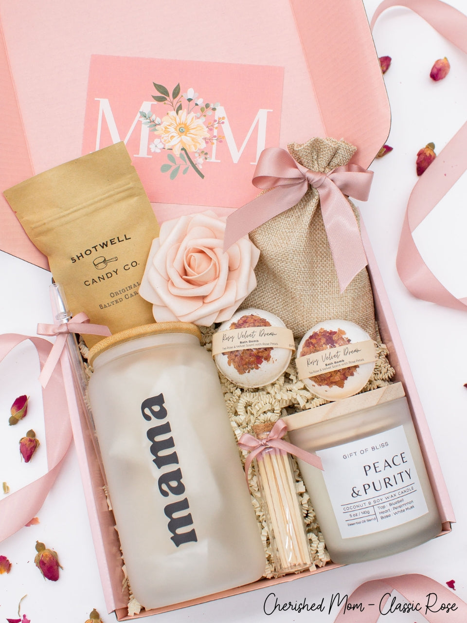 Cherished Mom gift box with fragrant bath treats, mom designed glass cup, soft caramels, a relaxing candle, and a beautifull rose. Pick from one of these three scents: Rose, Lavender, or Jasmine. Perfect to pamper and honor moms.