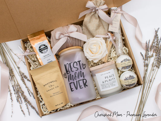 Mom gift box with fragrant bath treats, mom designed glass cup, mocha latte coffe, soft caramels, relaxing candle, cozy socks, and a beautifull rose. Pick from one of the three scents: Rose, Lavender, or Jasmine. Perfect to pamper and honor moms.