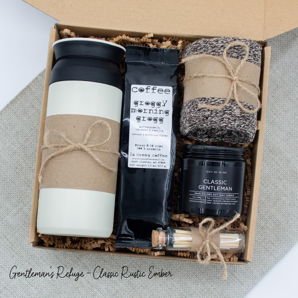 Specially crafted gift box for men, suitable for anyone valuing timeless style. Includes a stainless steel tumbler, coffee, aromatherapy candle, and cozy men's socks. A perfect gift for a comforting & indulgent experience.