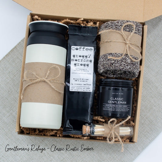 Specially crafted gift box for men, suitable for anyone valuing timeless style. Includes a stainless steel tumbler, coffee, aromatherapy candle, and cozy men's socks. A perfect gift for a comforting & indulgent experience.