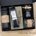 Specially crafted gift box for men, suitable for anyone valuing timeless style. Includes a stainless steel tumbler, coffee, aromatherapy candle, men's socks, notebook, and a wooden pen. A perfect gift for a comforting & indulgent experience.