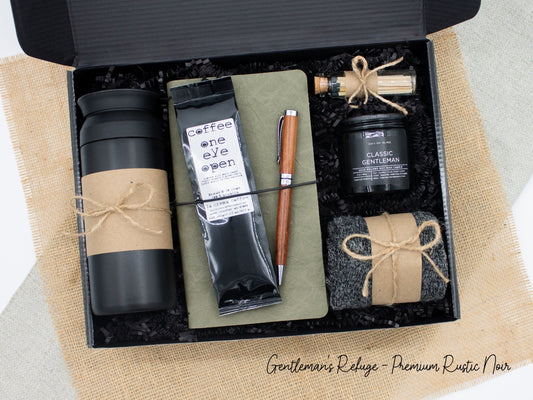 Specially crafted gift box for men, suitable for anyone valuing timeless style. Includes a stainless steel tumbler, coffee, aromatherapy candle, men's socks, notebook, and a wooden pen. A perfect gift for a comforting & indulgent experience.