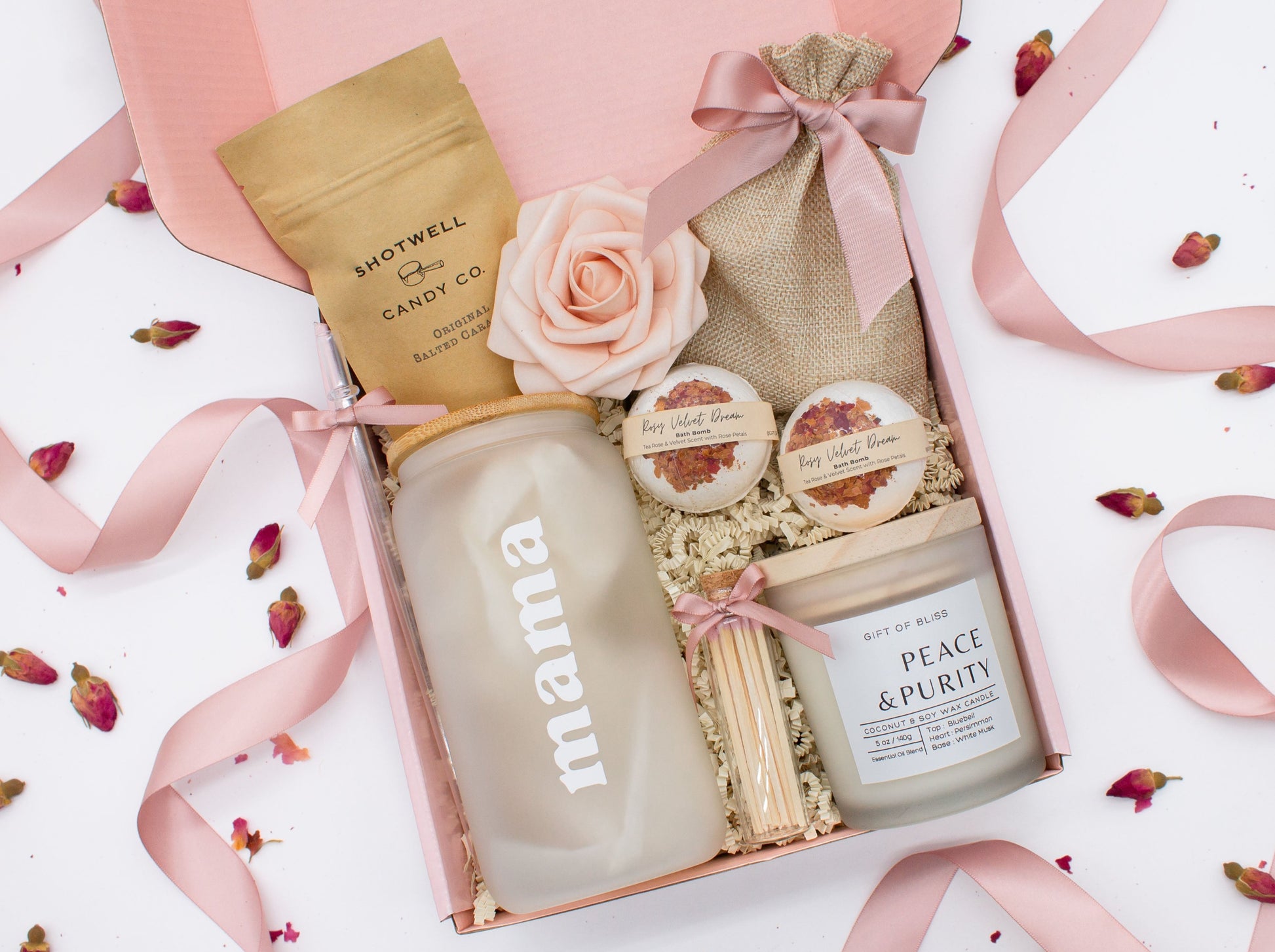 Cherished Mom gift box with fragrant bath treats, a Mama glass cup, soft caramels, a relaxing candle, and a beautifull rose. Pick from one of these three scents: Rose, Lavender, or Jasmine. Perfect to pamper and honor moms.