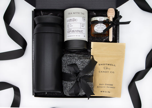 Specially crafted gift box for men, ideal for anyone. Includes a stainless steel tumbler, tea, honey, sweet treats, and cozy socks. Perfect for relaxation & appreciation, complete with a personalized greeting card.