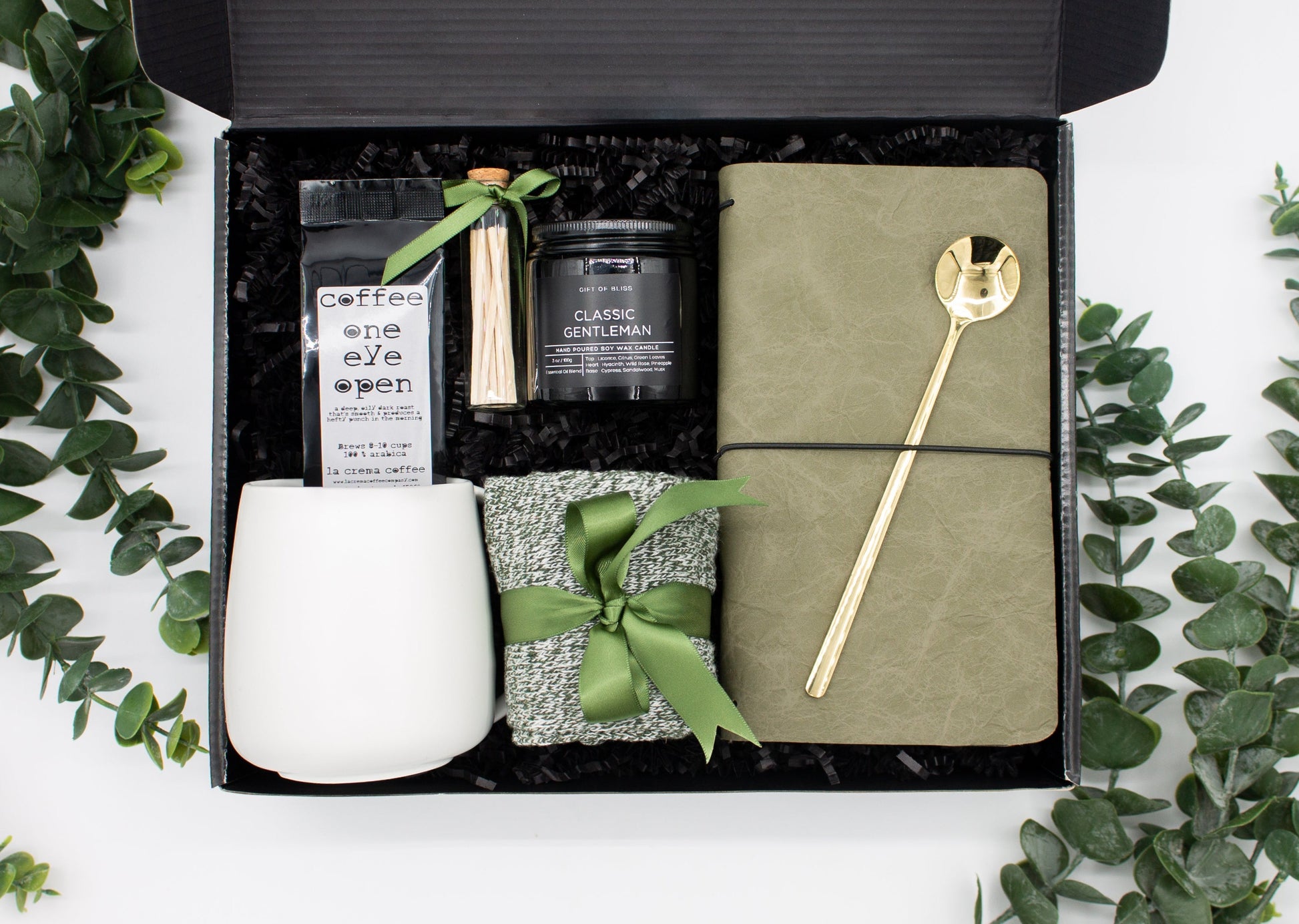 Urban Comfort (Specially crafted gift box, ideal for modern individuals who value style and comfort. Includes 12 oz ceramic mug, long-handled golden spoon, rich coffee, aromatic candles and matches, stylish men's socks, and notebook, all arranged for a memorable experience.)