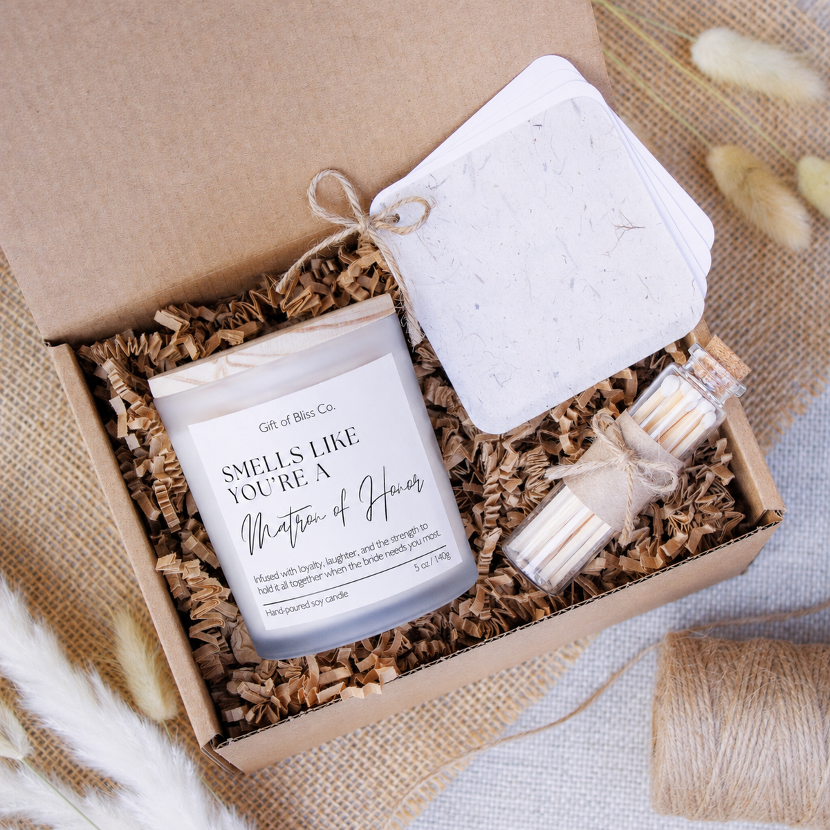 Smells Like You're a Matron of Honor candle in a frosted jar with matches and keepsake booklet in a kraft gift box