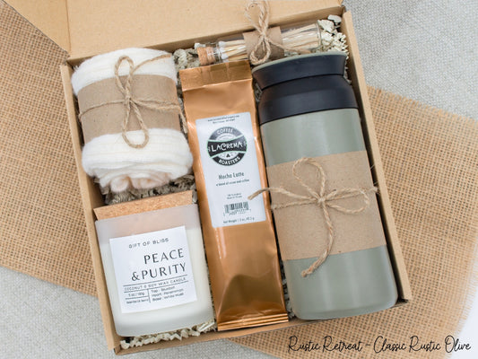 A specially crafted gift box for those who appreciate rustic charm and elegance. Features a stainless steal tumbler, choice of coffee, luxurious caramel, a soothing candle with matches, and cozy socks, perfect for both relaxation and practicality.