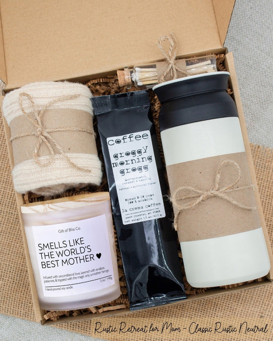 A specially crafted gift box for moms who appreciate rustic charm and elegance. Features 12 oz tumbler, coffee, soothing candle with matches, and cozy socks, perfect for both relaxation and practicality.