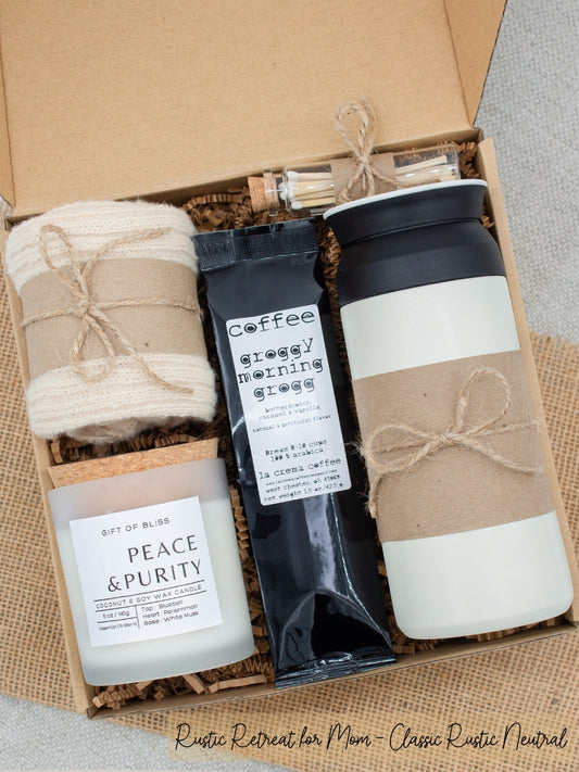 A specially crafted gift box for moms who appreciate rustic charm and elegance. Features 12 oz tumbler, coffee, soothing candle with matches, and cozy socks, perfect for both relaxation and practicality.
