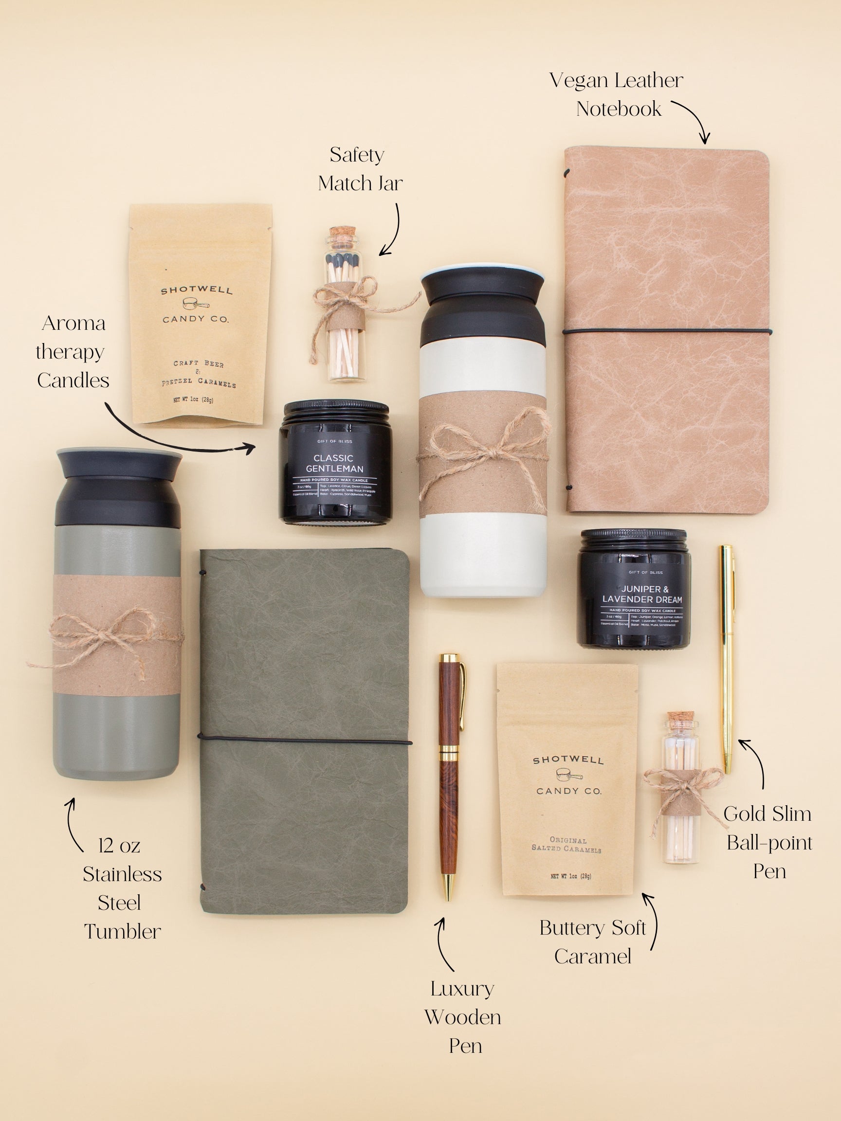 A gift box for two, features two stainless steel tumblers, two notebooks with a gold pen and a wooden pen, gourmet caramels, and two aromatic candles. Perfect for couples, friends, or colleagues to enjoy a relaxing, creative experience together.