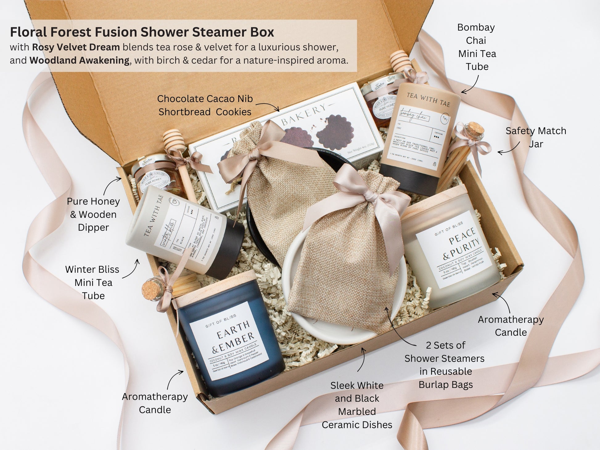 A spa gift box for 2. Features shortbread cookies, 2 soothing tea blends, honey and wooden dipper, 2 aromatic candles, and 2 sets of shower steamers. This elegantly curated box, ideal for couples, enhances shared moments of intimacy and relaxation.