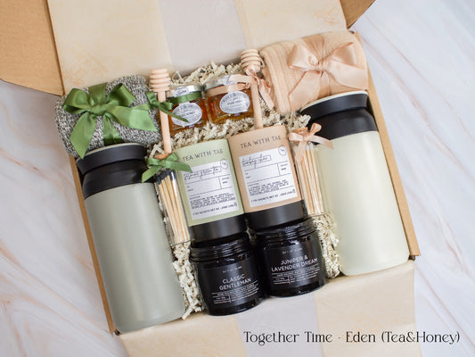 A gift box designed for two. Includes two stainless steel tumblers, a selection of fine tea and honey, elegant match jars, uniquely scented candles, and cozy socks for both. Ideal for creating shared moments of relaxation and connection.