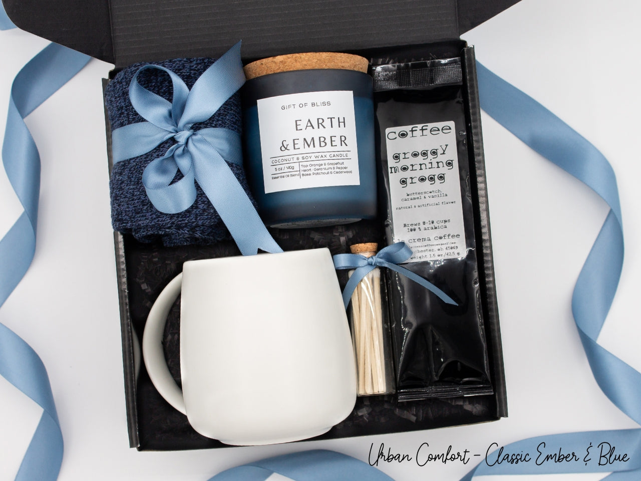 Specially crafted gift box, ideal for modern individuals who value style and comfort. Includes 12 oz ceramic mug, selection of coffee flavors, aromatic candles and matches, and stylish mens socks, all arranged for a memorable experience.